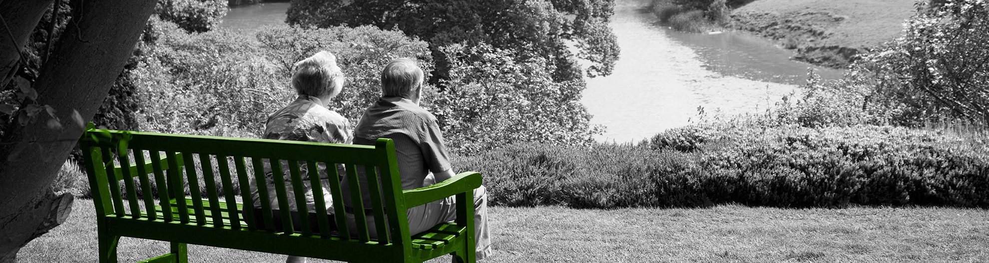 Retired Couple On Bench